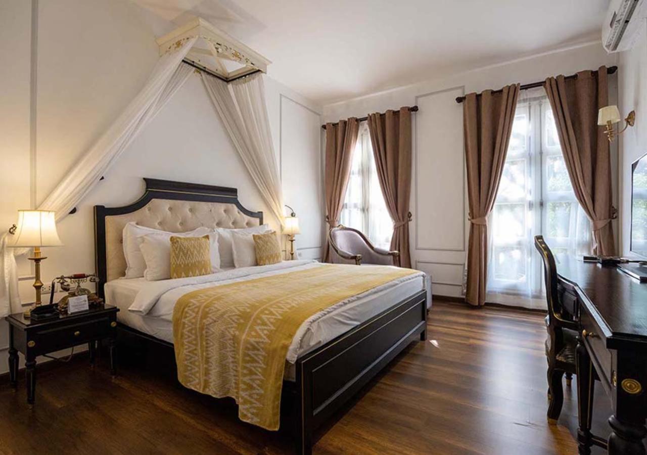 Le Thatluang D'Or Boutique Hotel Вьентьян Экстерьер фото