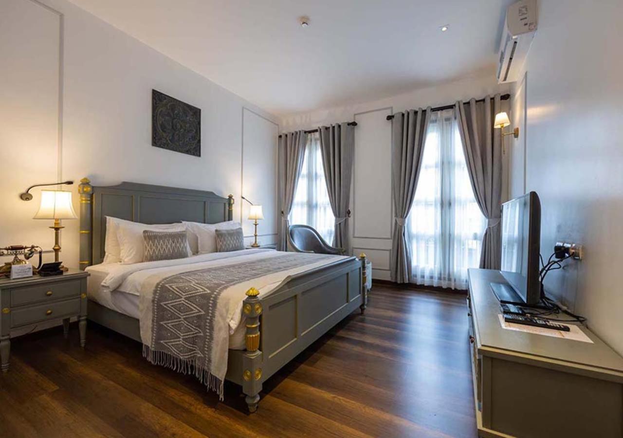 Le Thatluang D'Or Boutique Hotel Вьентьян Экстерьер фото