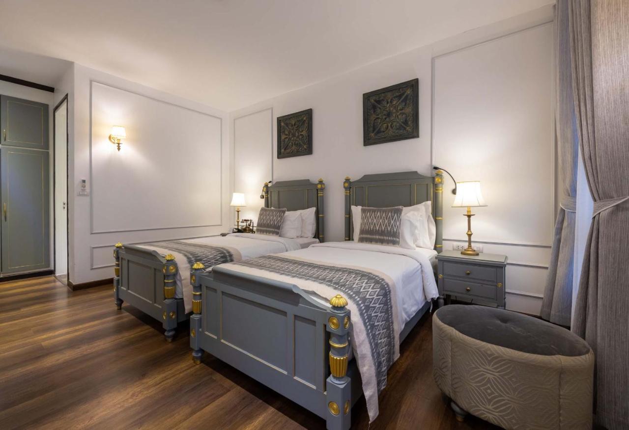 Le Thatluang D'Or Boutique Hotel Вьентьян Экстерьер фото